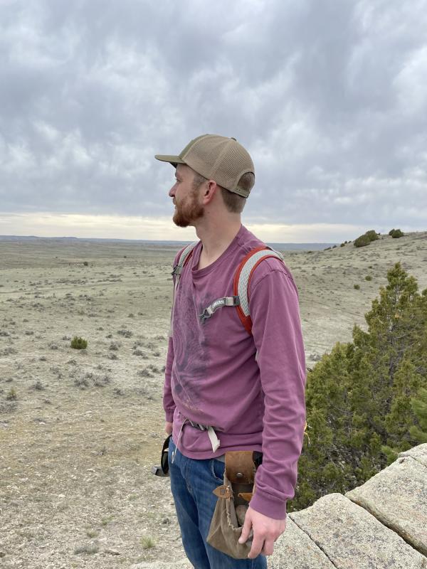 A man standing in front of Open plains in Casper Wyoming