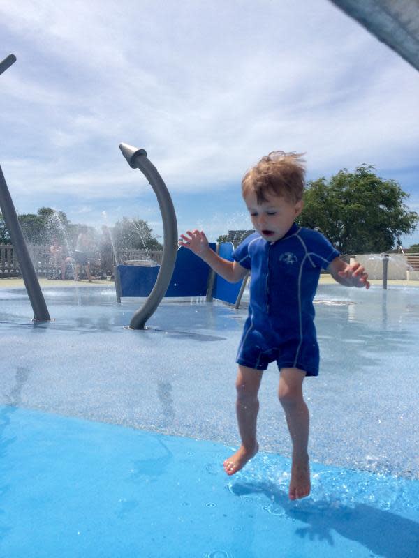 Small boy playing in the water