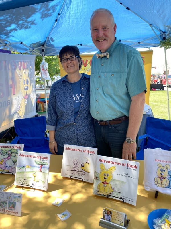 Charles Rowe with wife at Farmers & Artisan Market