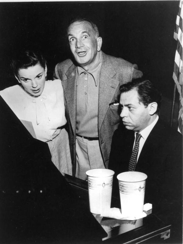 Judy Garland, Al Jolson, and pianist Oscar Levant on stage at Post 519 playing on our 1905 Steinway. American Legion