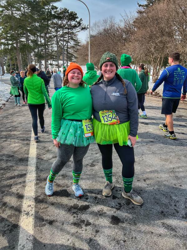 2 women smiling after completing the Shamrock 4-miler