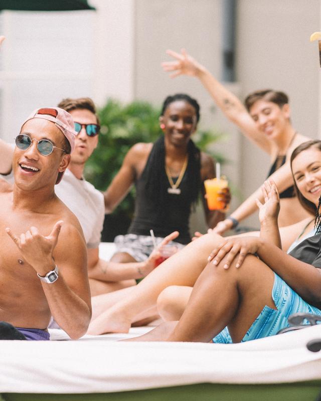 Group of friends enjoying the Bourbon Orleans pool