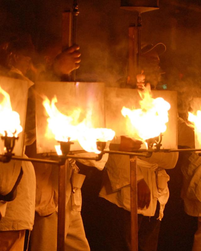 Flambeaux Lining Up at the Start of a Parade