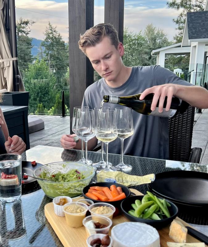 Max Brayer - pouring wine