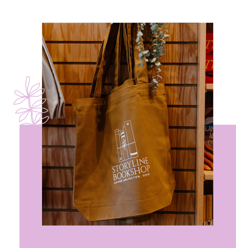 Brown leather tote with Storyline Bookshop logo printed in white