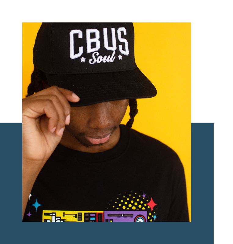 Man wearing a black hat with the words "CBUS Soul" in white