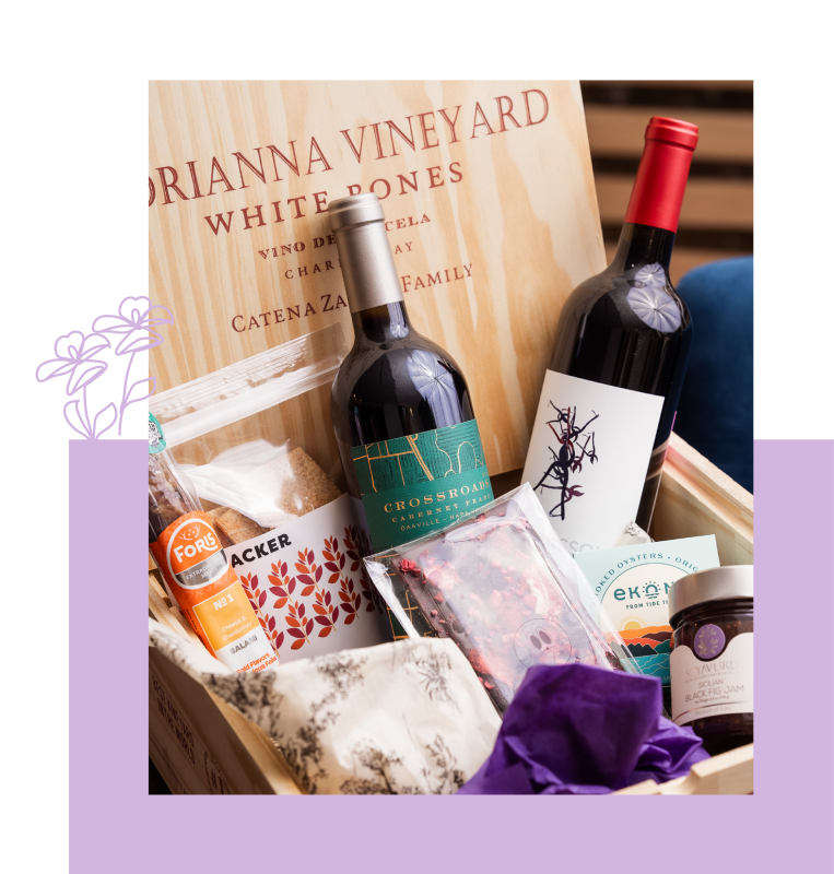 Gift box with two bottles of wine, black fig jam, salami and other products made in Columbus