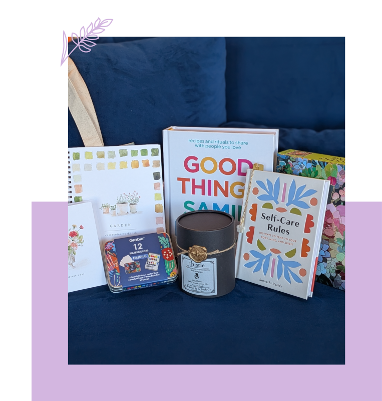 Assortment of books and puzzles sitting on a blue couch