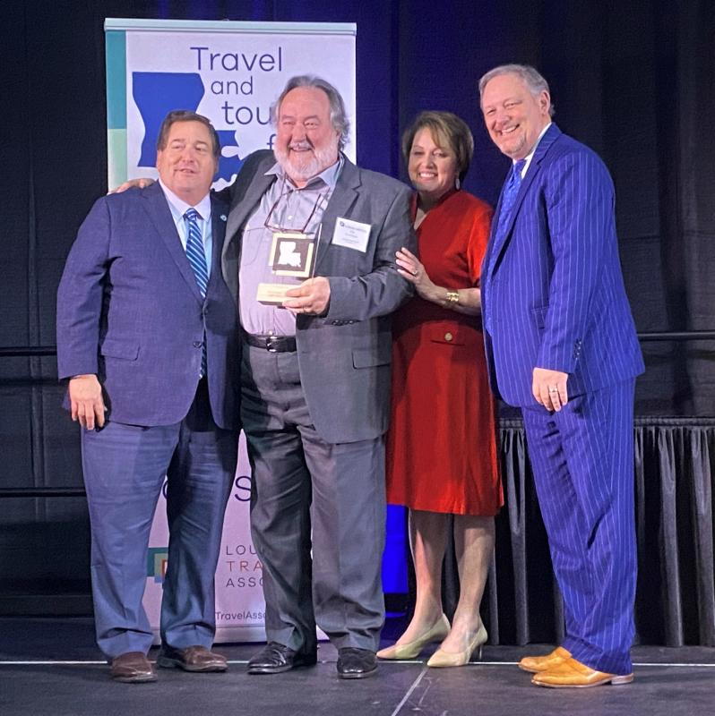 Chef Pat Gallagher receives Louey Award for Restaurateur of the Year from Lt. Governor Billy Nungesser, LTA President and CEO Jill Kidder and LTA Board Chair Kyle Edmiston