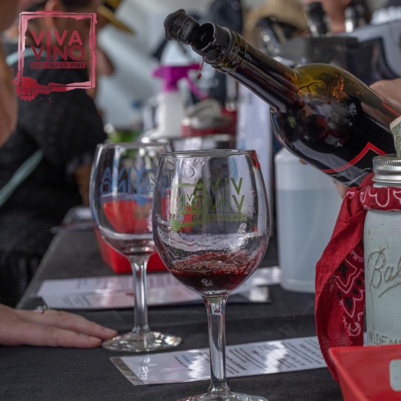Glasses of wine are poured at the Harvest Wine Festival.