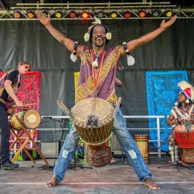 A band plays on a stage.