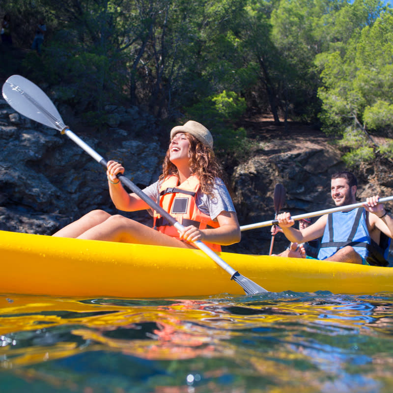 Man and woman kayaking through Get Out Adventures