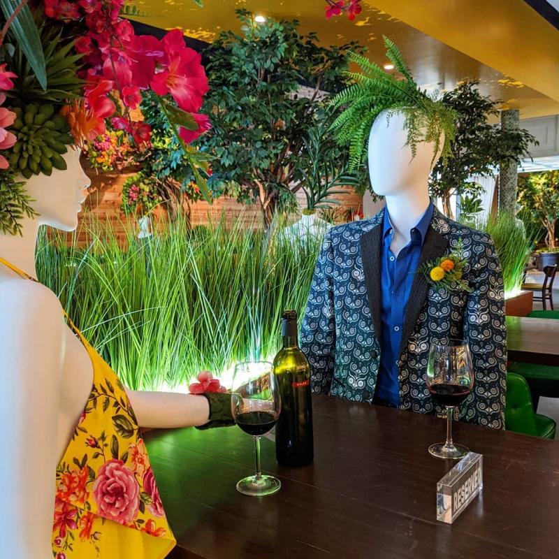 Mannequins with plants as hair at Hugo's Invitados in Irving, TX