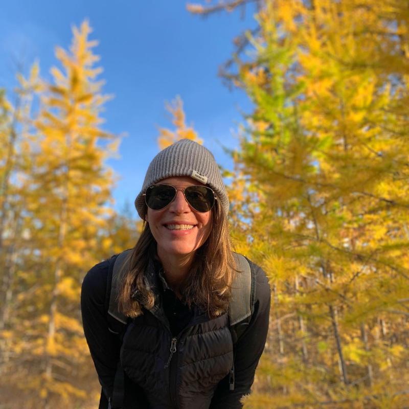 Lisa Kadane pictured with Larch Trees