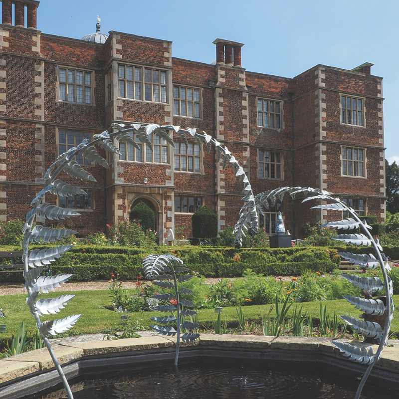 Image shows a picture of the sculpture festival at Doddington Hall.