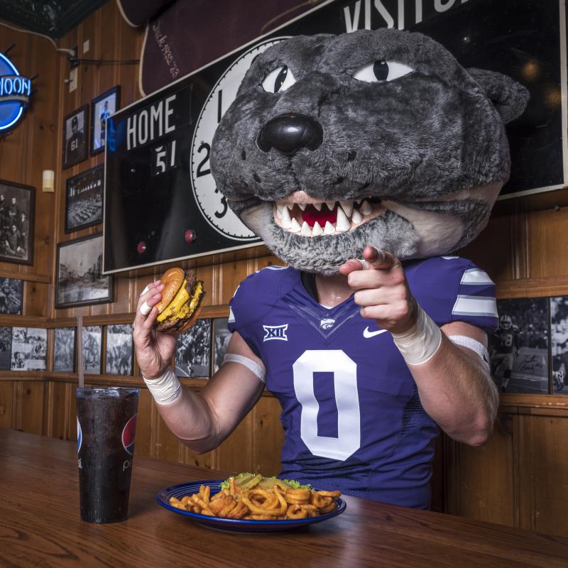 Willie enjoys a burger