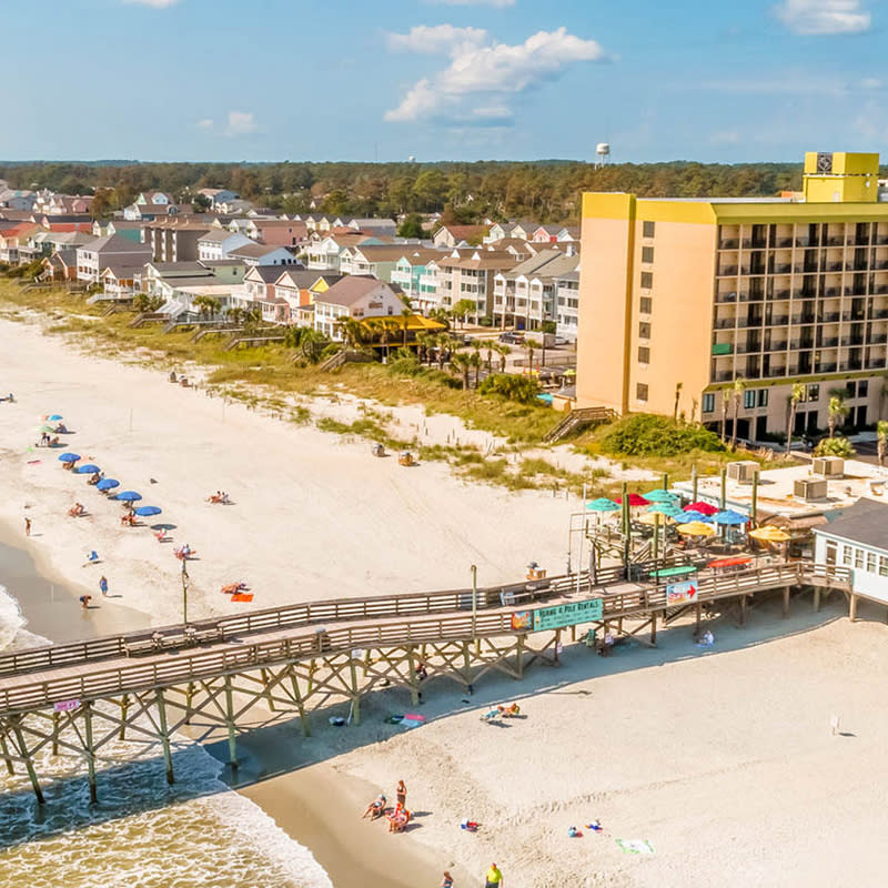 Oceanfront hotel with pier in Surfside Beach