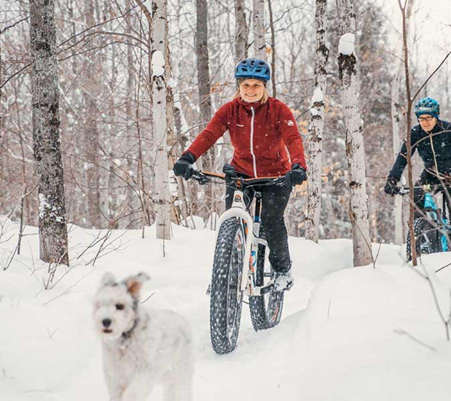 A couple enjoying fat tire biking at Swedetown Trails