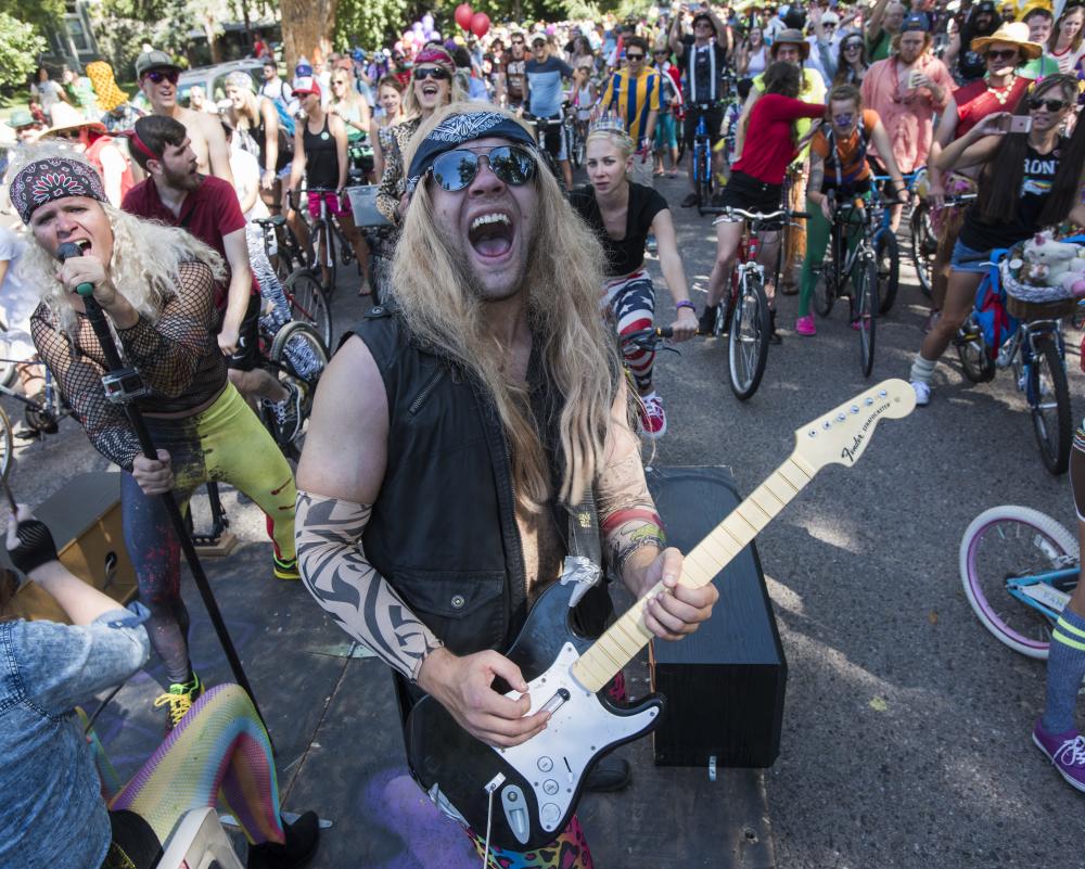 Bikes, Beers and Bands Tour de Fat Performer with guitar