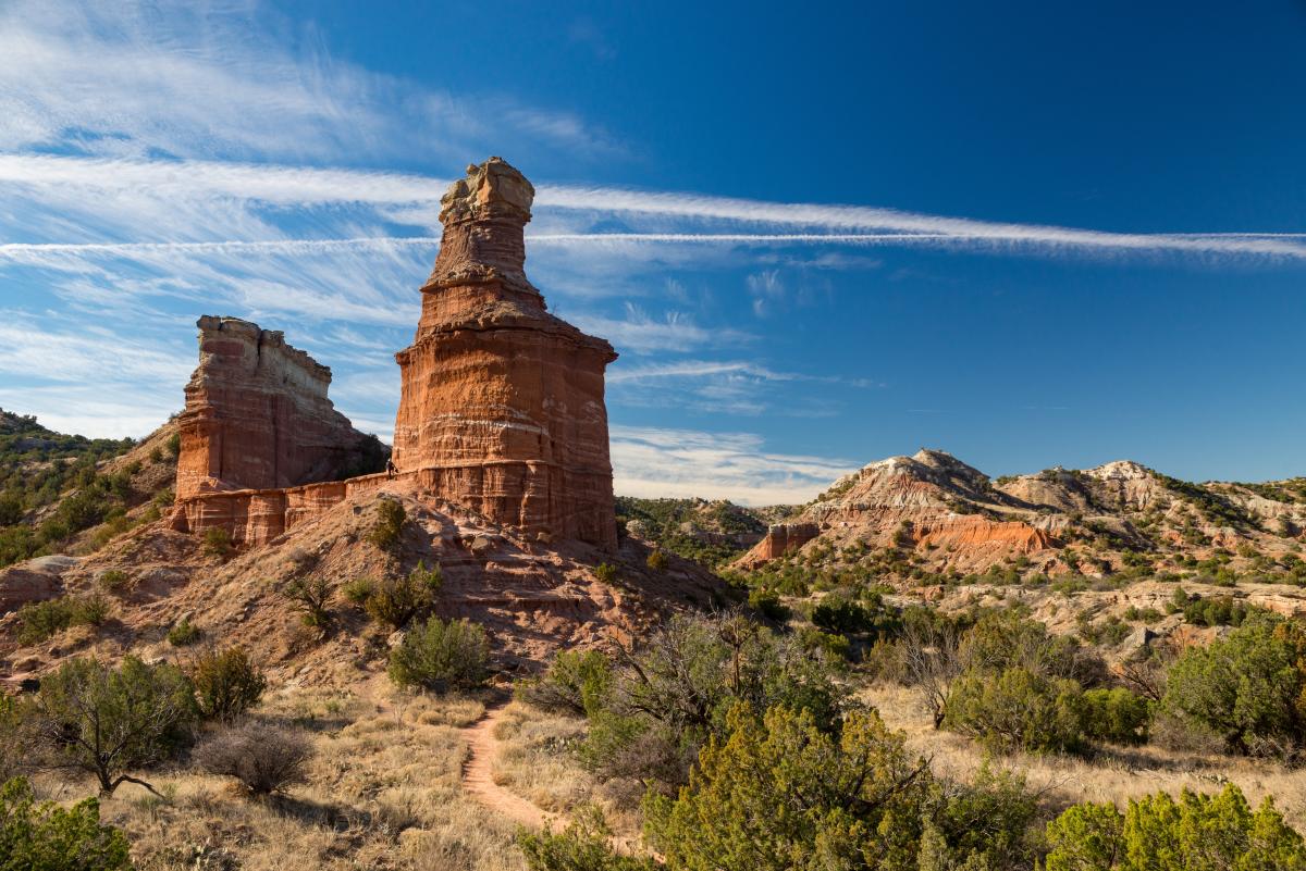 photo looking up at the lighthouse rock formation in palo duro canyon in the afternoon