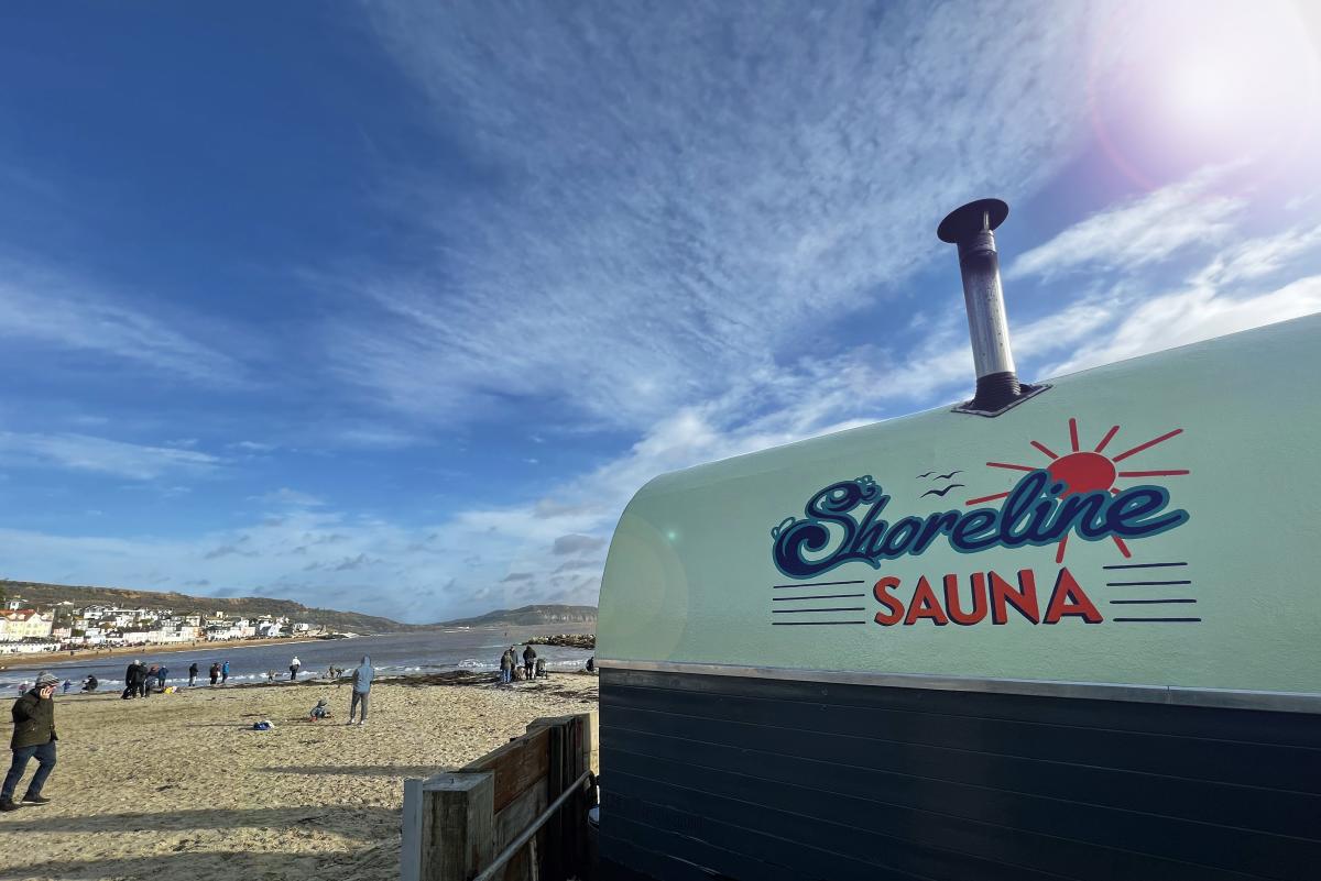 External view of the new location of the Shoreline Sauna on the sandy beach at Lyme Regis in Dorset
