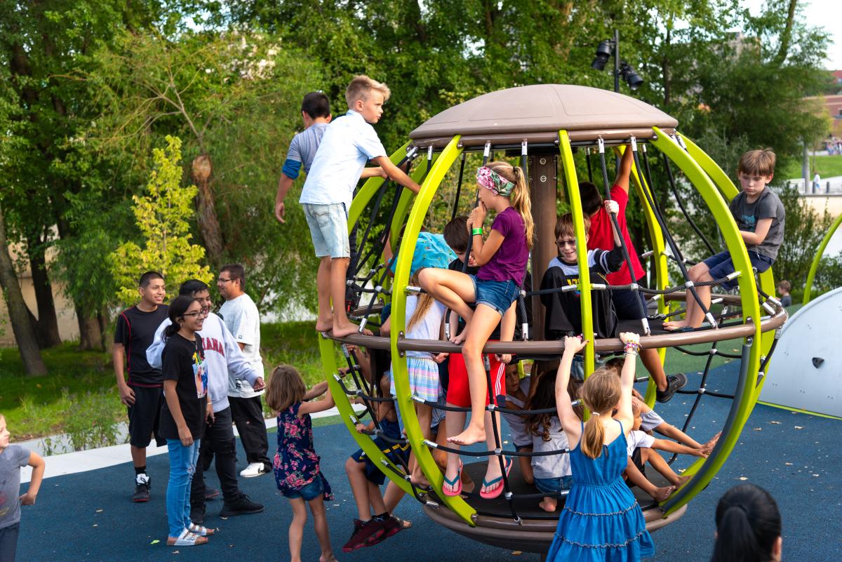 Kids at the PNC Playground at Promenade Park