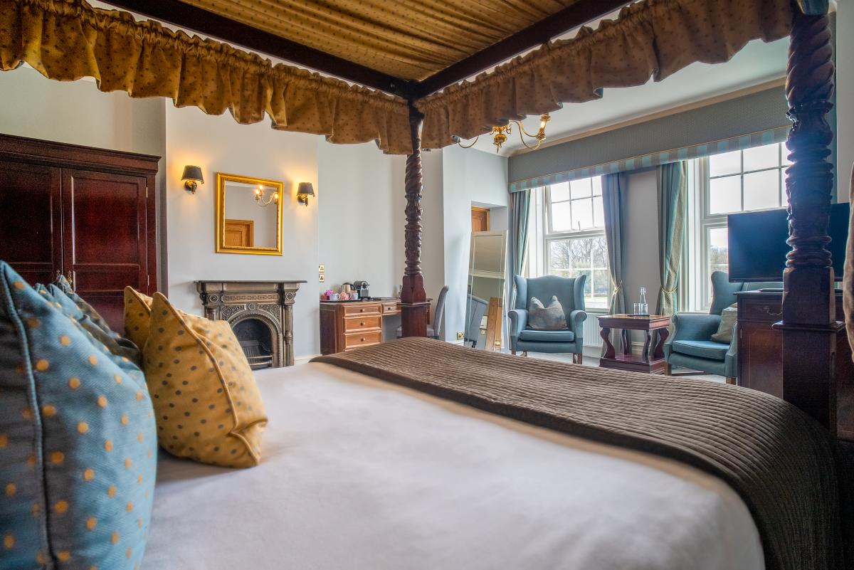 Interior of a luxury bedroom at Balmer Lawn Hotel