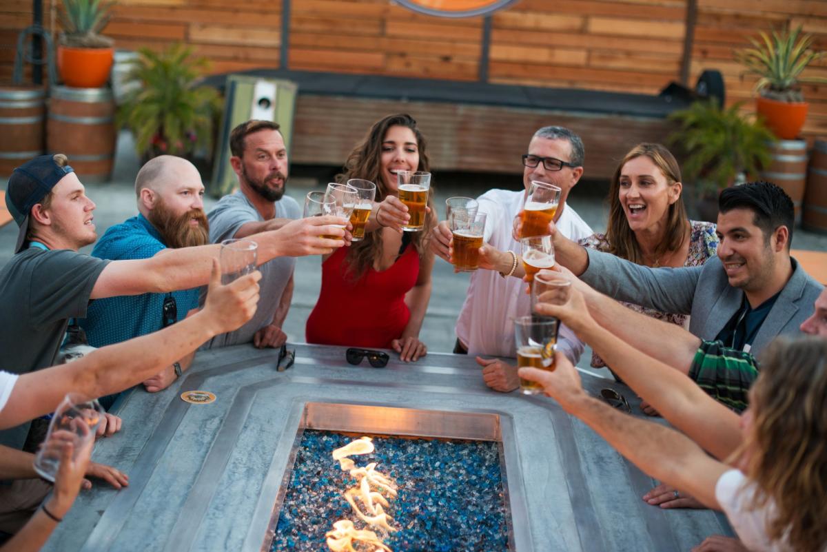 Group Cheersing over beer