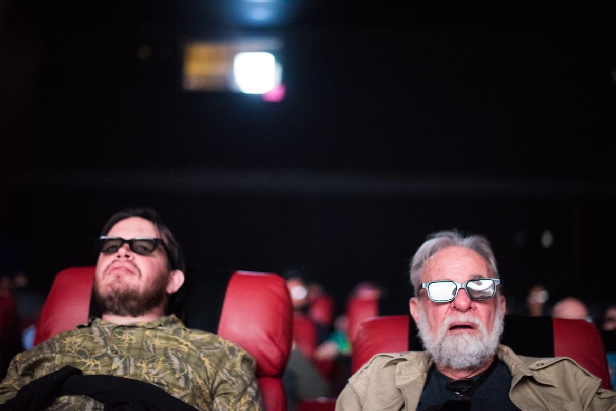 men watching a film at SLO IFF