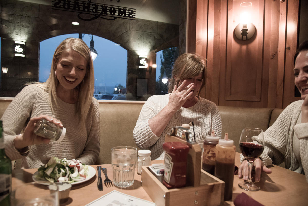 Women at a restaurant eating dinner at Zermatt Resort