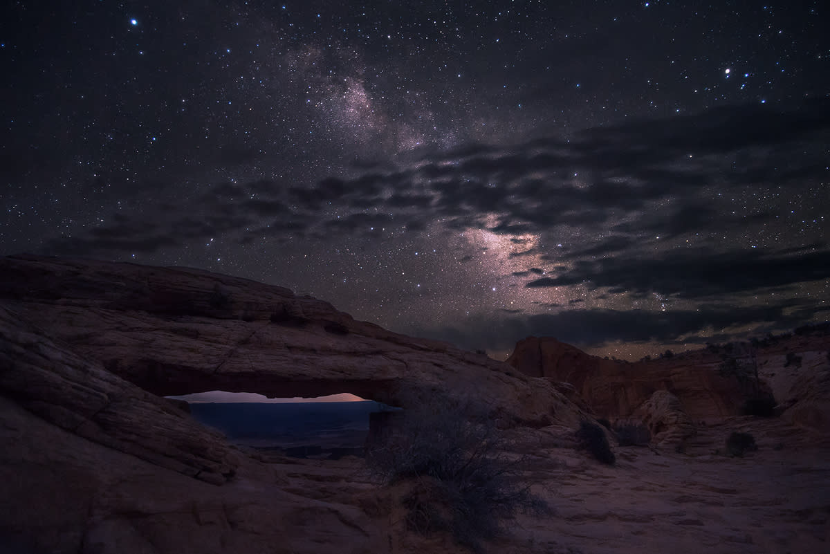 The Night Sky seen over the Mesa Arch in Canyonlands National Park