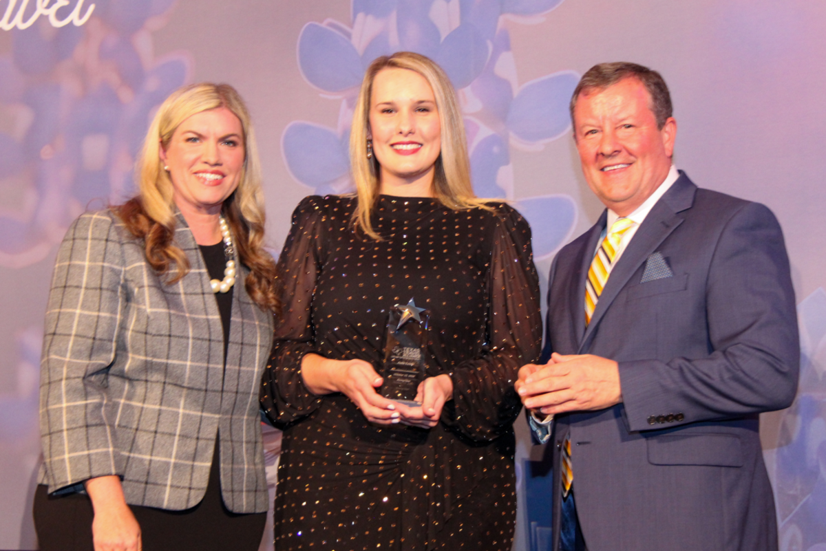 Josie Lewis received the Texas Travel Alliance’s Rising Star Award at the 39th Annual Texas Travel Summit, held October 14-16, 2024 in Houston, TX, pictured with Erika Boyd, President & CEO, Texas Travel Alliance (left), and Nick Wolda (right).