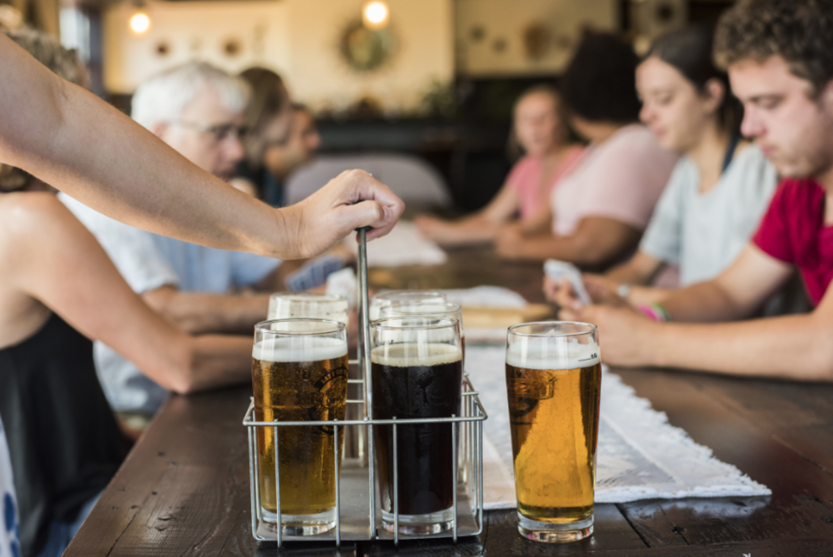 A group enjoying beer at Lazy Monk Brewery