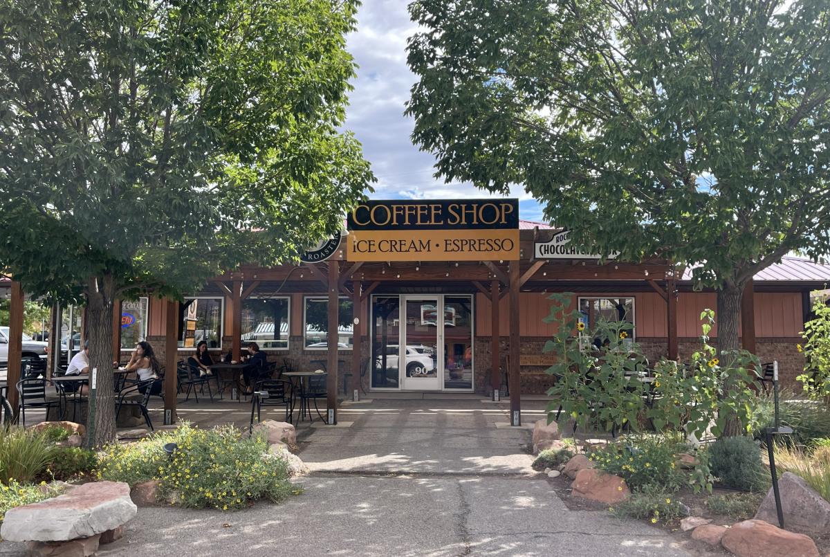 Exterior of Moab Coffee Roasters with outdoor seating located on Main Street in Moab, Utah.