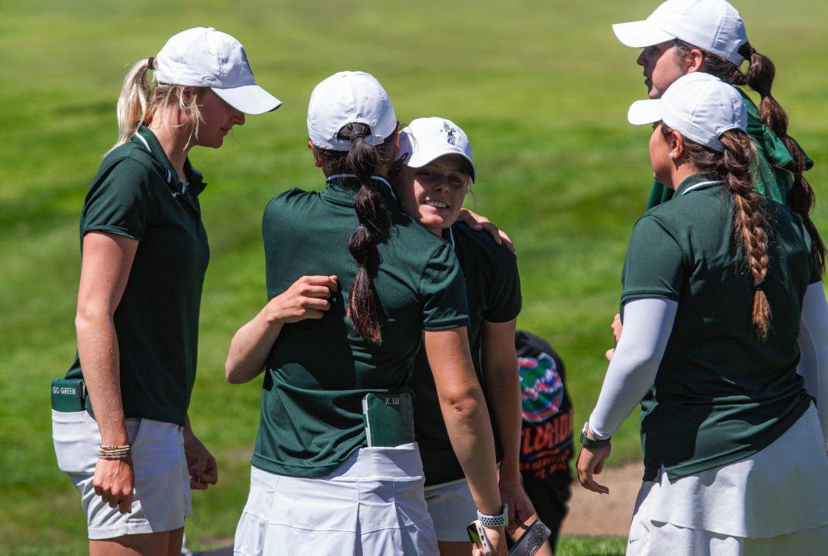Michigan State Women's Golf Team Hugging