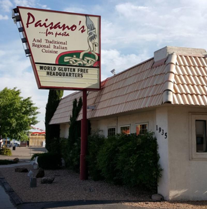 A picture of the exterior of Paisano's Italian Restaurant. The sign says "world gluten free headquarters."