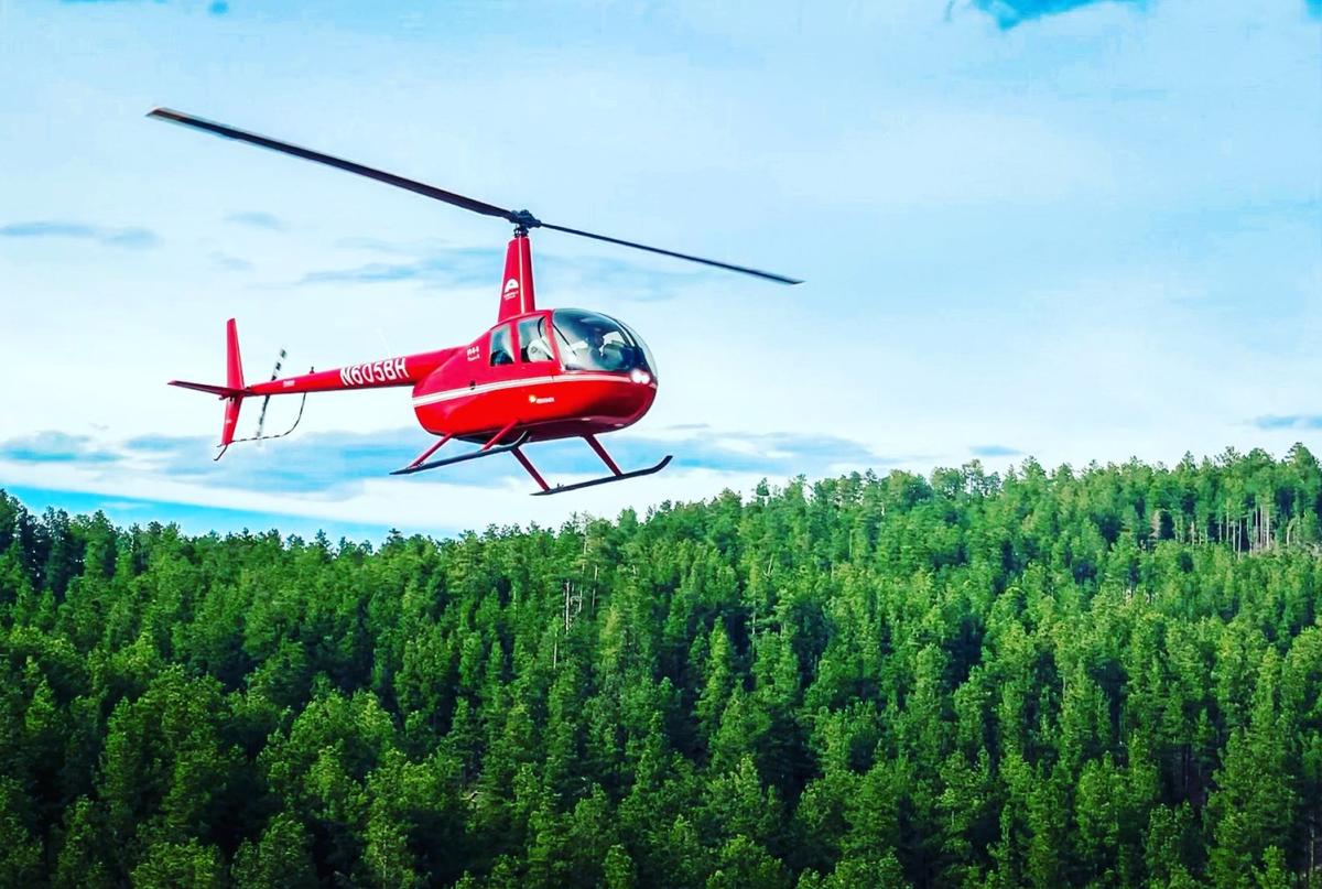 Helicopter flying over the Black Hills