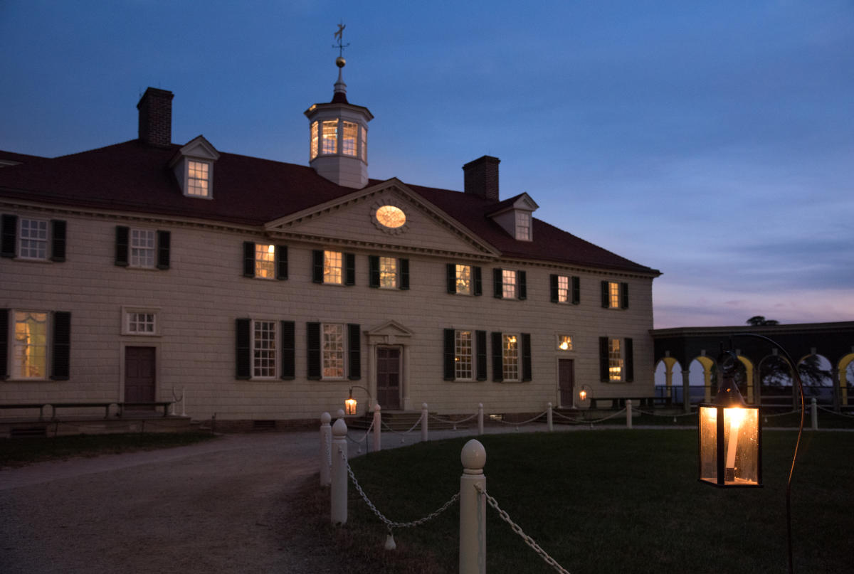 Angled View of George Washington's Mount Vernon's Main House During Winter Candlelight