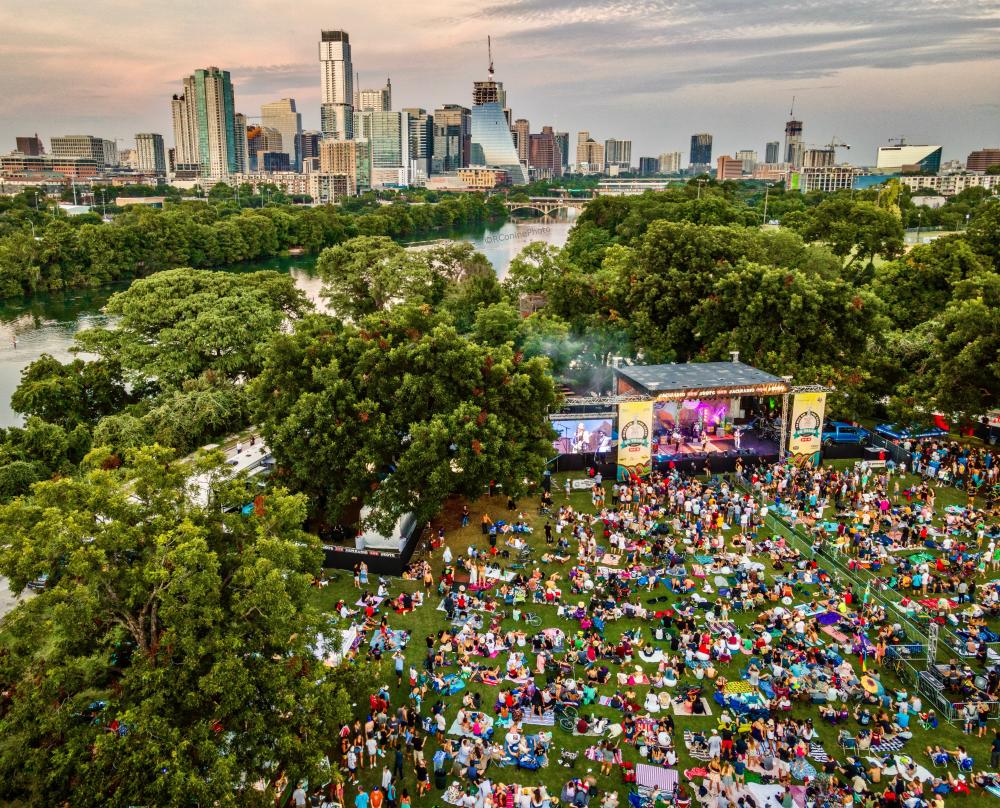 Aerial photo of Blues on the Green with downtown skyline in the background.