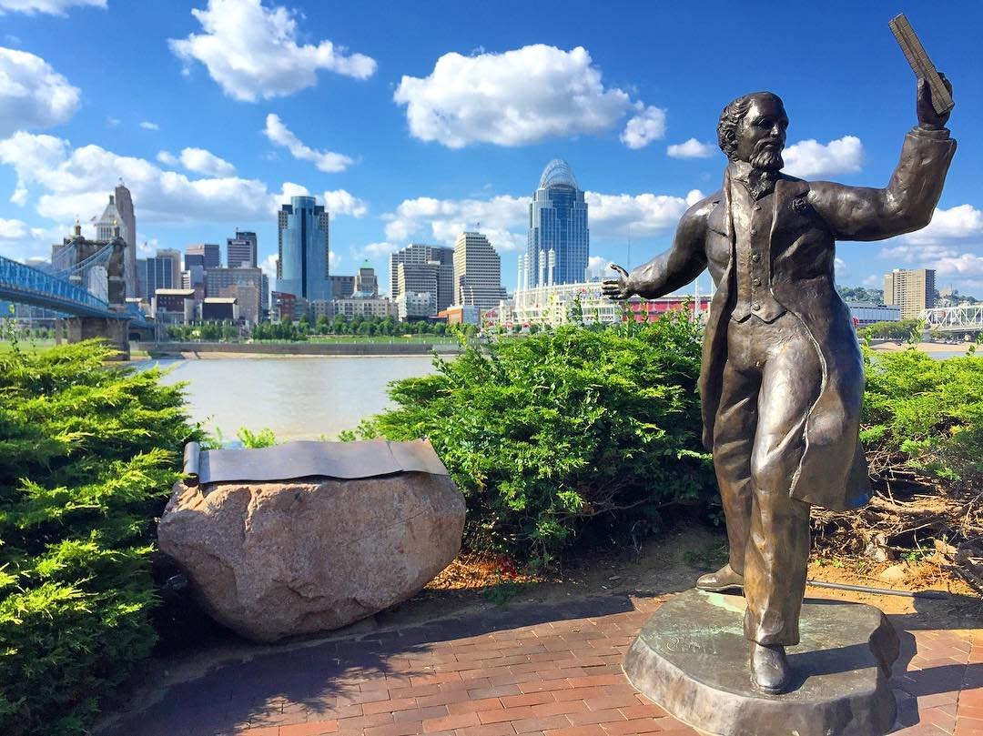 roebling-bridge-cincinnati-skyline-statue-blue-sky-summer-cincyrefined