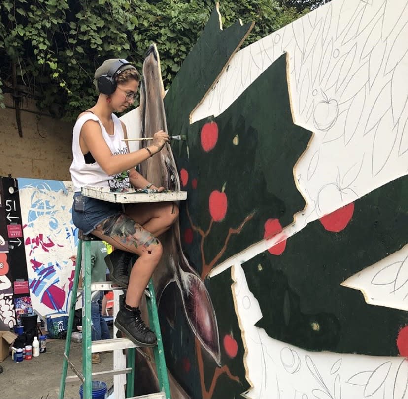 Mandi Caskey painting at Urban Scrawl