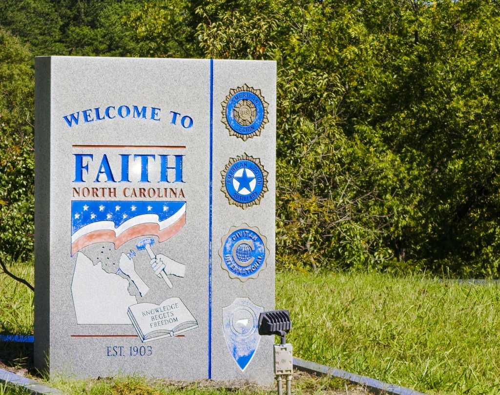 Monument welcoming you to the town of Faith