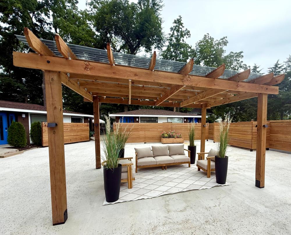 Outdoor shared patio space at The American Hotel in Williams Bay.