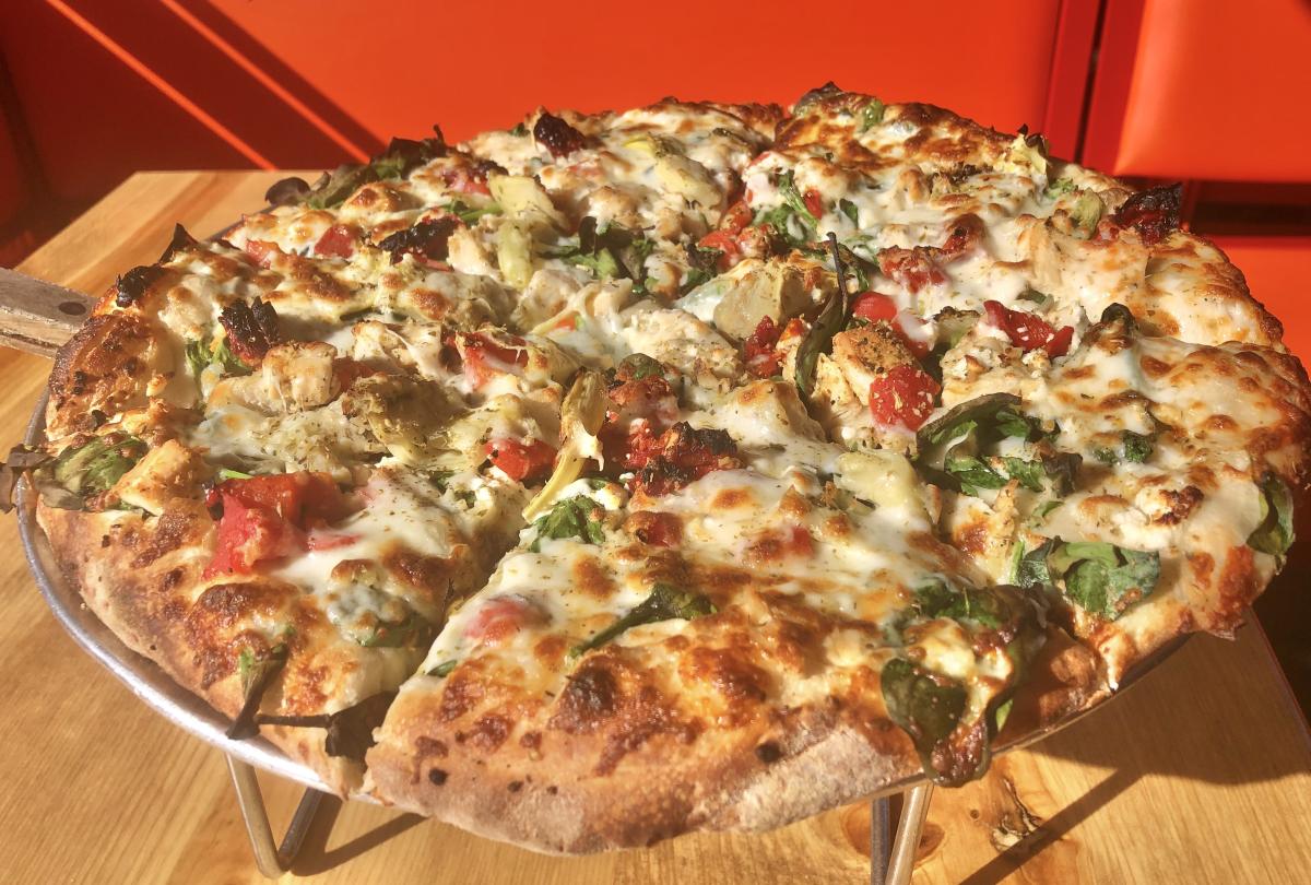 The Tuscan Chicken Pizza from Pizzeria Bambinos located in Cathedral City.