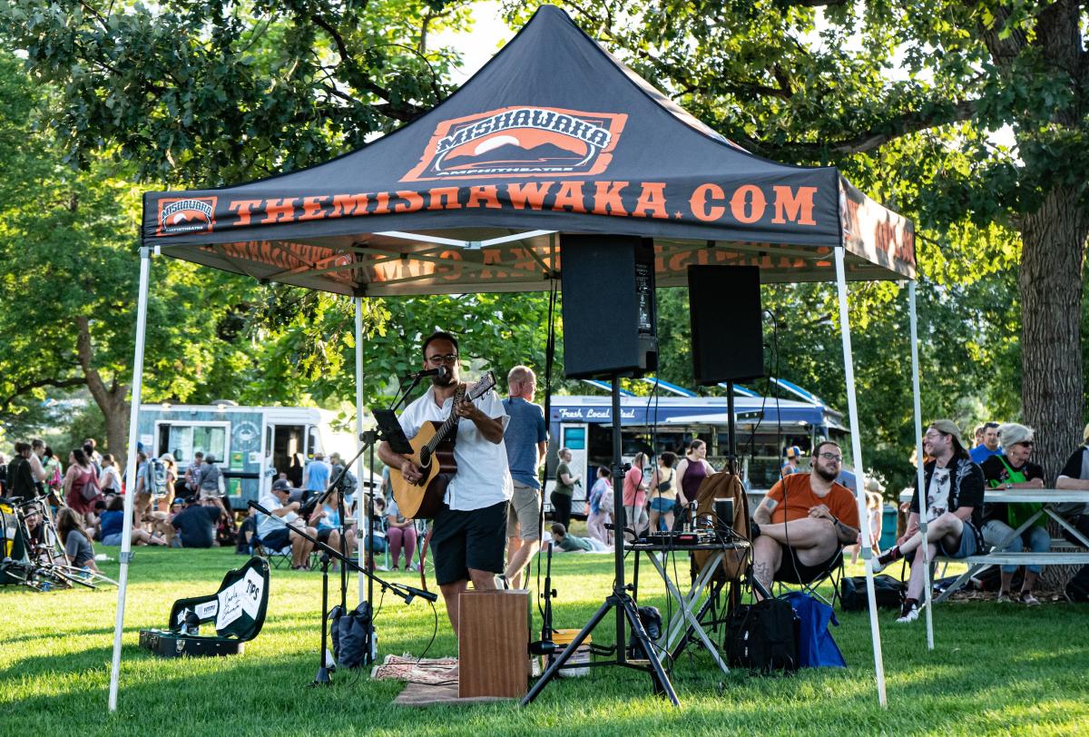 Person playing music at the food truck rally