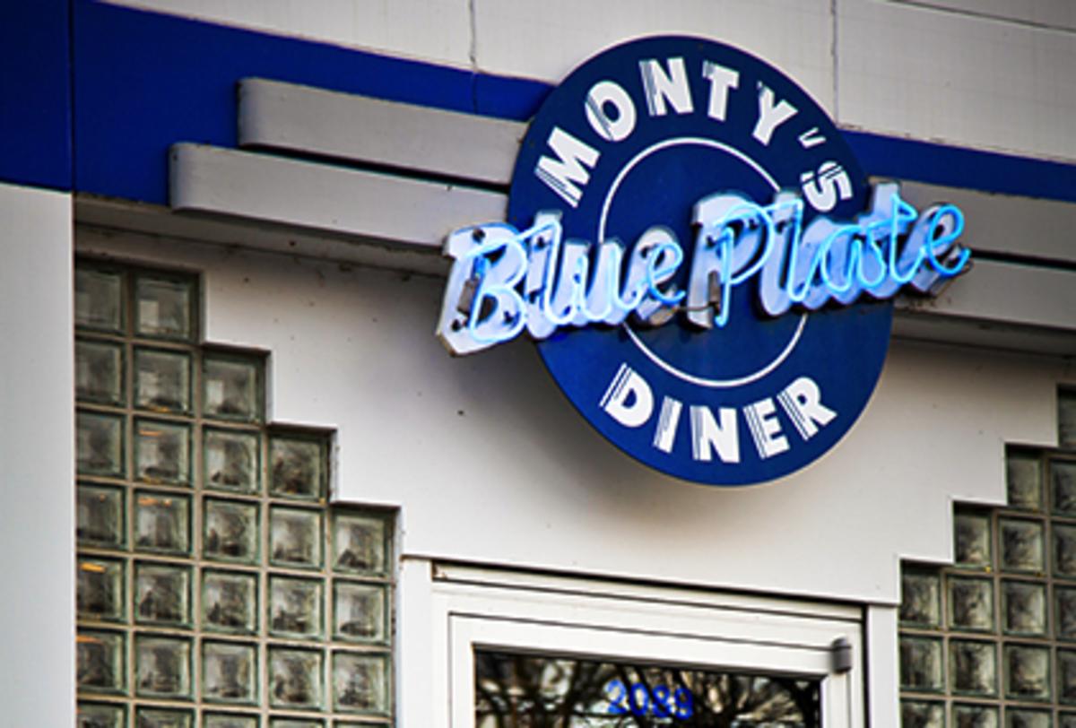 The neon exterior sign at Monty's Blue Plate Diner in Madison