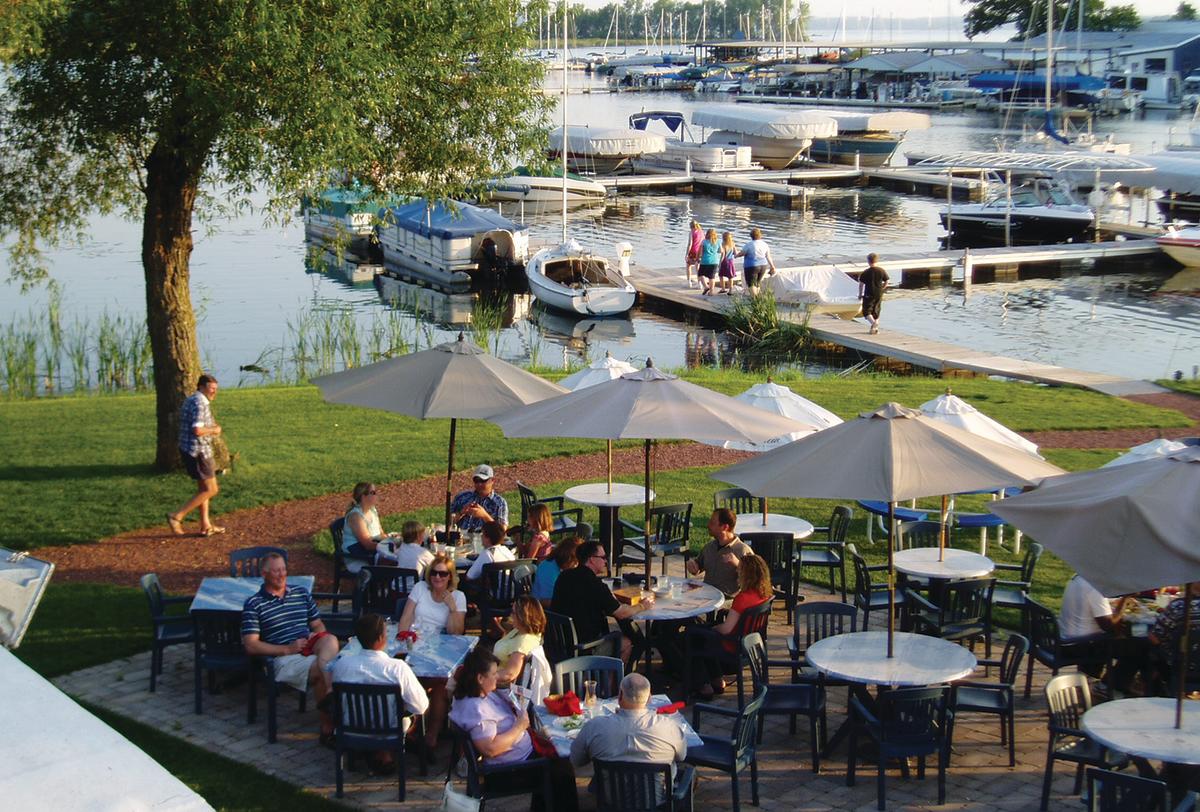 An outdoor patio along the waterfront at Mariner's Inn