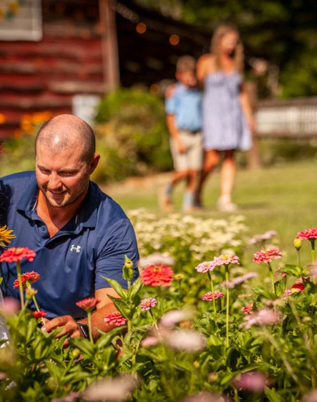 Family in flower field