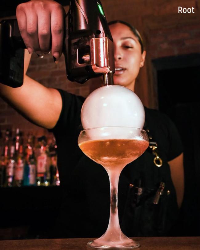 Root bartender making drink