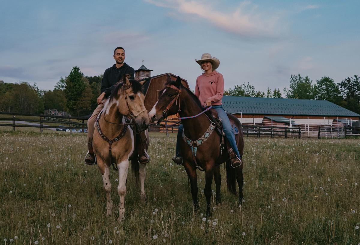 Couple Horseback Riding